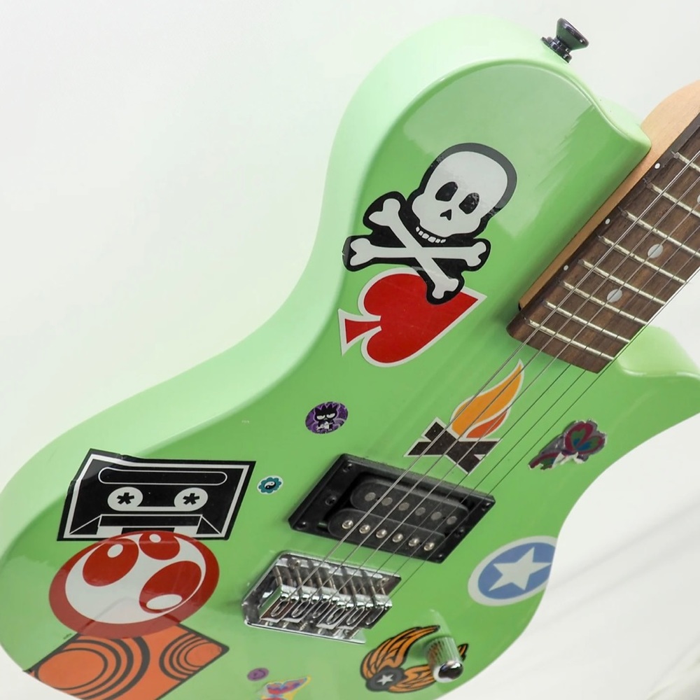 First act green electric guitar
